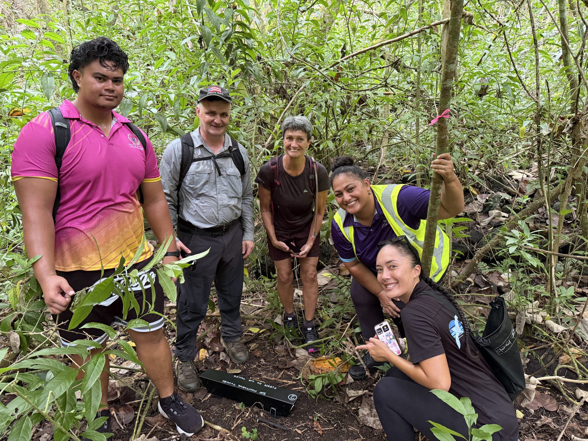 Dr Tim Martin with forestry staff and community members during an invasive species management training session in Te Manga forest, Rarotonga, Cook Islands